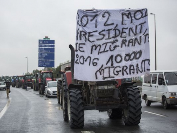 Truckers block French highway in migrant camp protest